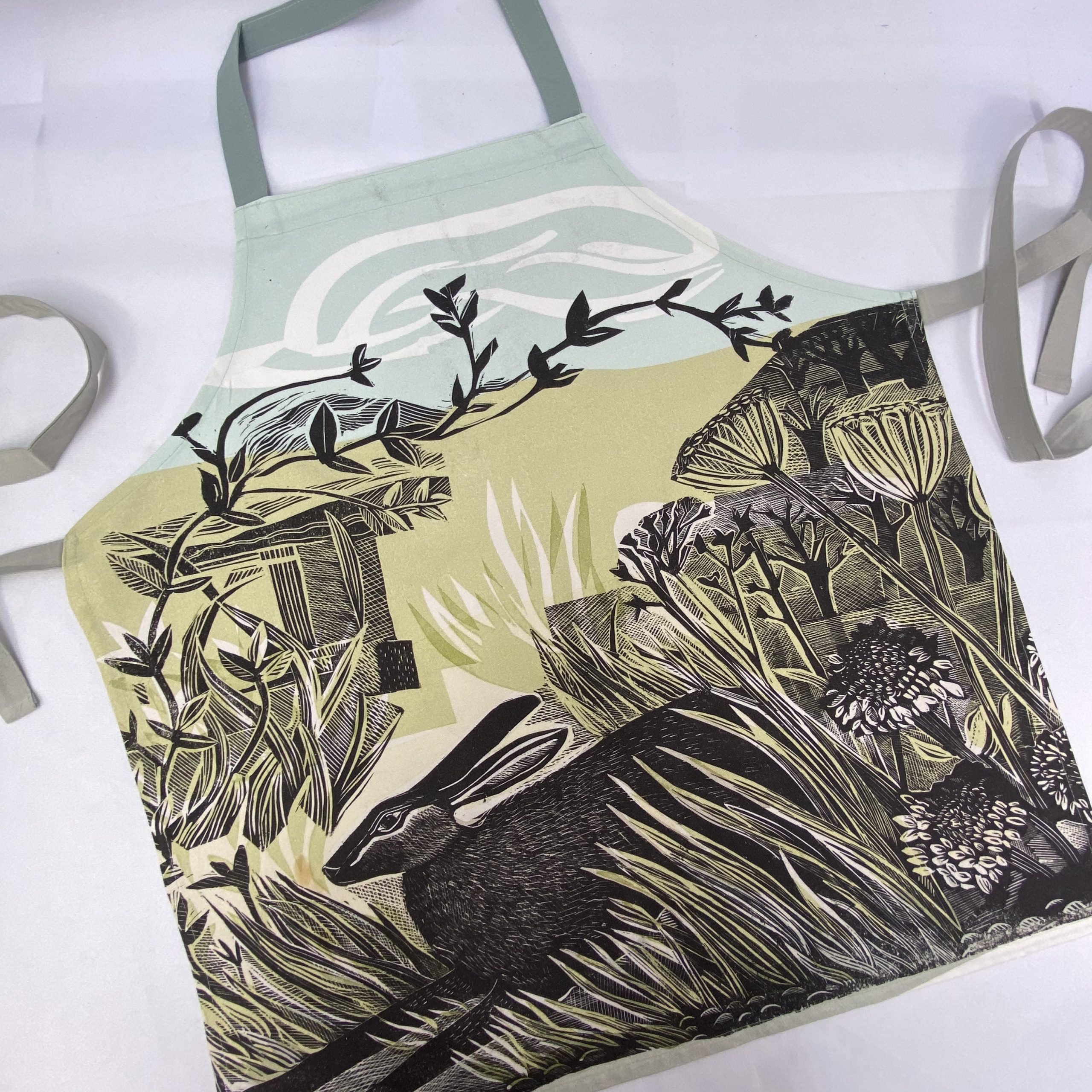 Screen printed textile merchandise including aprons by Paul Bristow