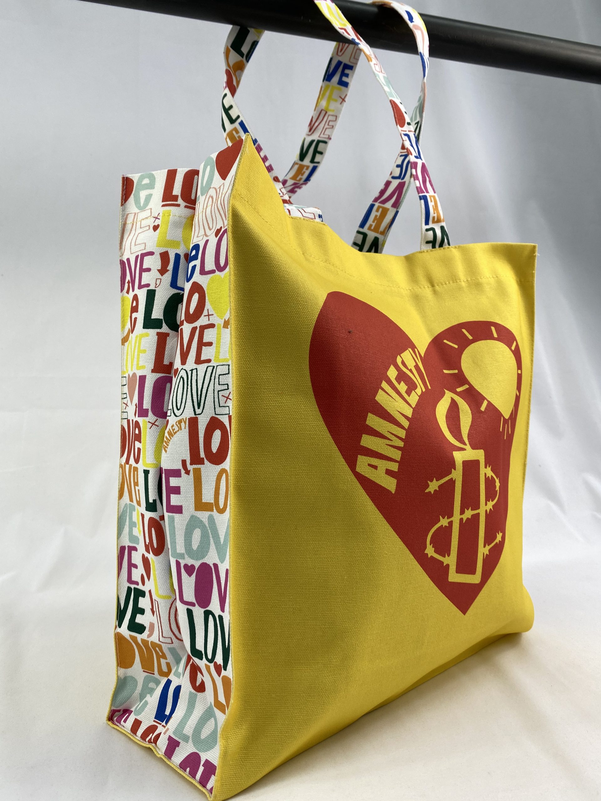 Organic Cotton large box tote bag designed by RUDE for Amnesty International made by Paul Bristow sustainable bags