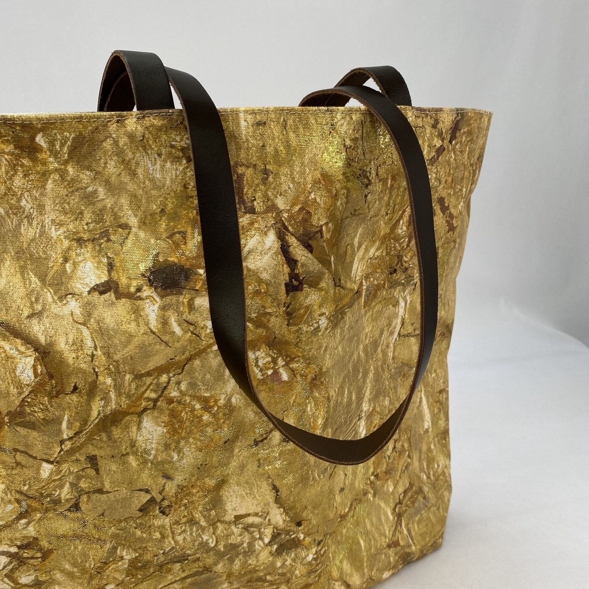 Innovative gold foil printing onto a digitally printed tote bag of a Rauschenberg artwork for the Tate