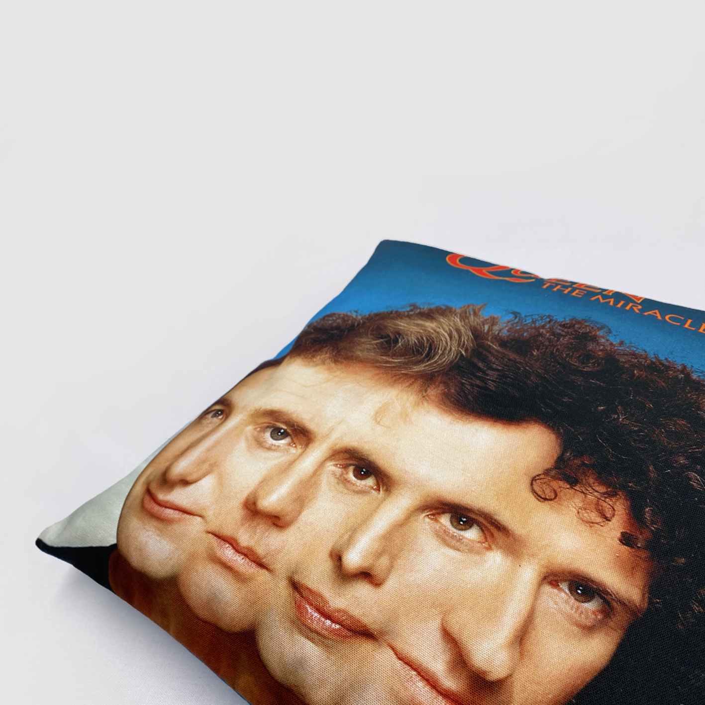 Queen and The Miracle cushion cover merchandise.